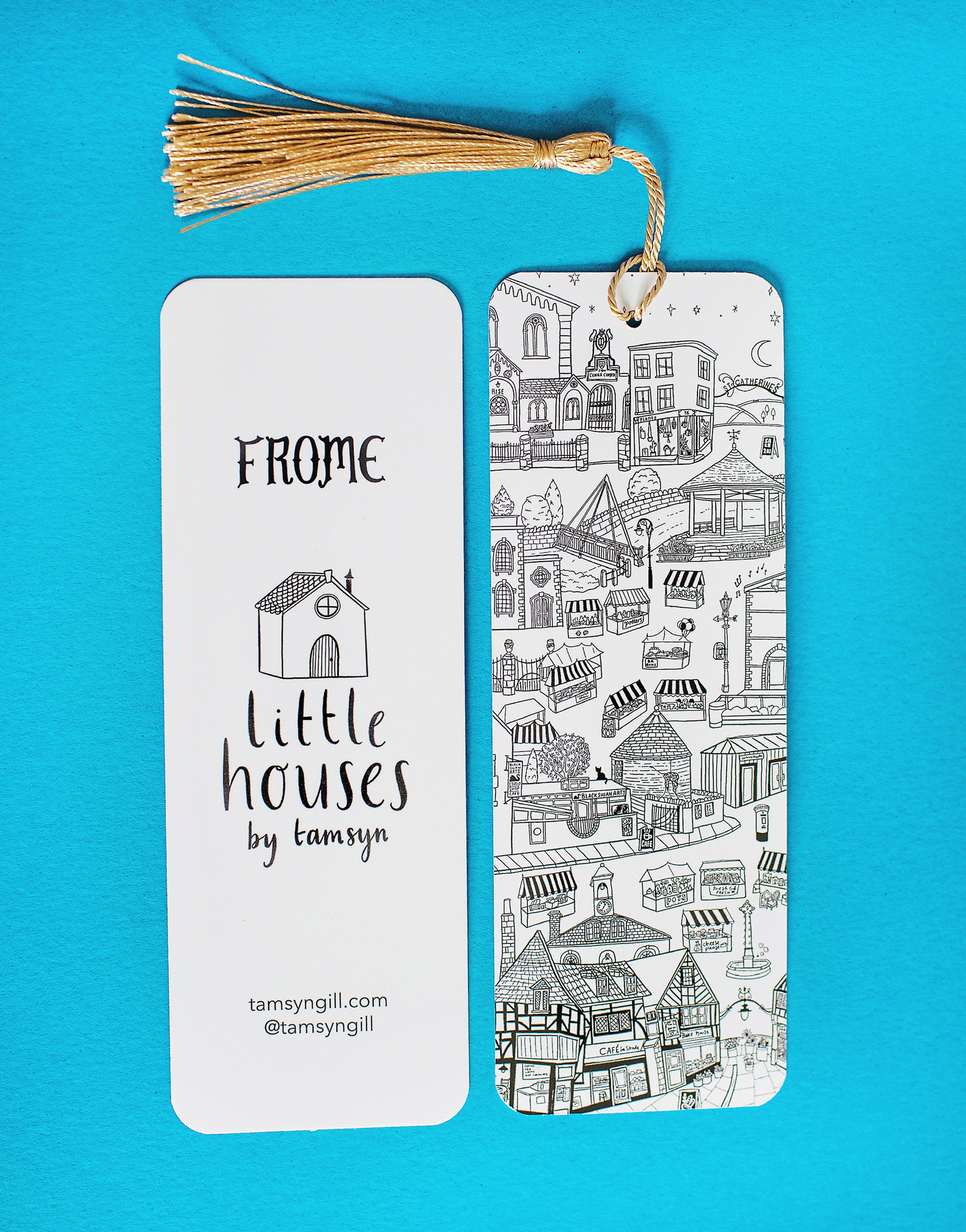 A front and back view of 'Frome' bookmark, with gold tassel